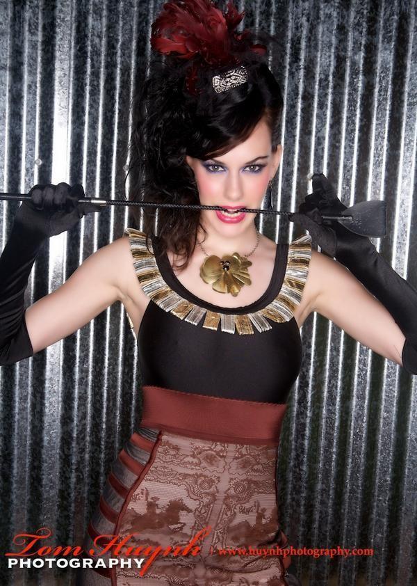 Female model photo shoot of BreannaElise in Spanish Fly Hair Garage