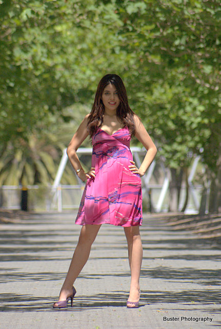 Female model photo shoot of Joan Garcia by Buster Photography in Bi-Centenial Park, makeup by icon makeup artistry