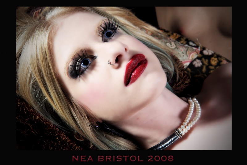 Female model photo shoot of xrated buddha by Nea Bristol, makeup by ABJL Hair and Makeup