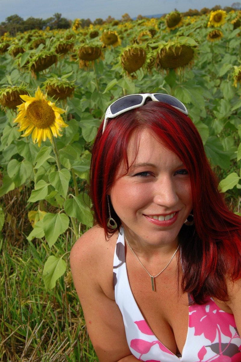 Female model photo shoot of Red Clover