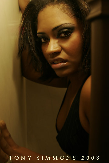 Male and Female model photo shoot of Tony Simmons and esabella in Basement, makeup by Starr Artistry