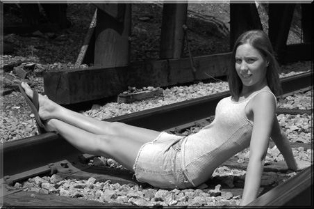Female model photo shoot of Arrington Photography in Carrollton, GA historic bridge