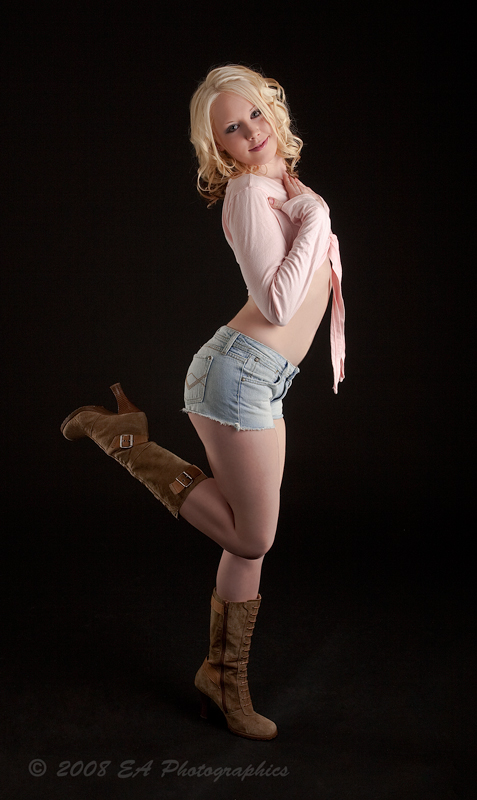 Female model photo shoot of Miss Puss In Boots by EA Photographics