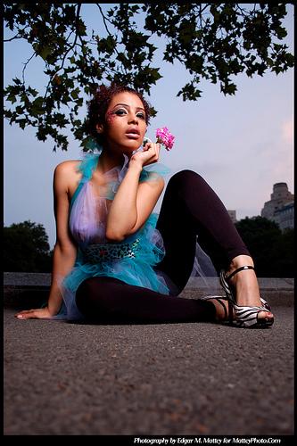 Female model photo shoot of DiscoMakeupAire in @ Central Park in Nyc