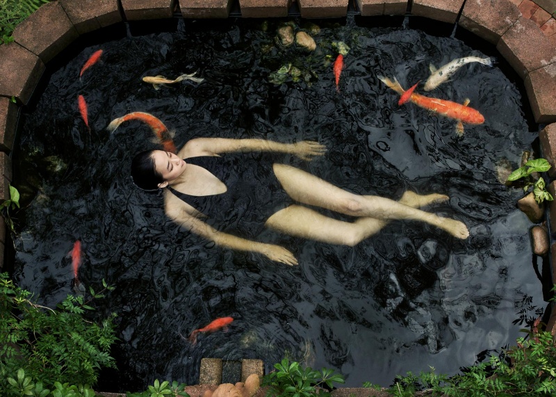 Female model photo shoot of Tiffany Ting Ting Chen in Claire's Koi Pond
