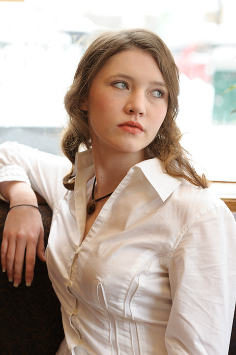 Female model photo shoot of M Carr by Jim Kaye in Cafe