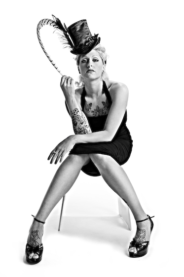 Female model photo shoot of Dottie Diamond by Laura Domela, clothing designed by Billie Jo Retro