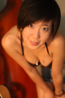 Female model photo shoot of Jun Hou in New York Apartment
