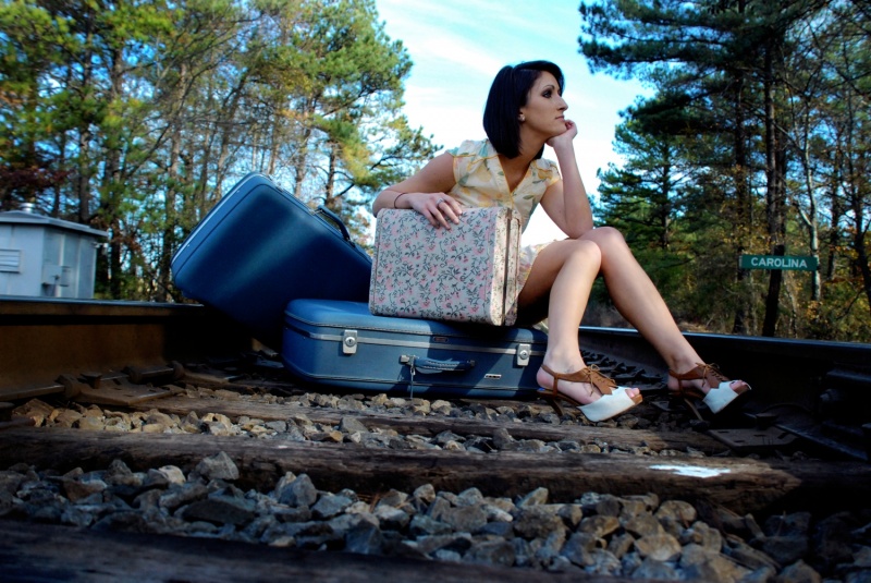 Female model photo shoot of Caitlin Corsetti by Brittney M Photography in train tracks