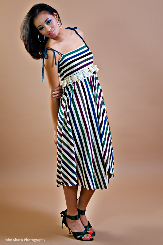 Female model photo shoot of MONET TURNER by J Sharp , wardrobe styled by Brownskin Design