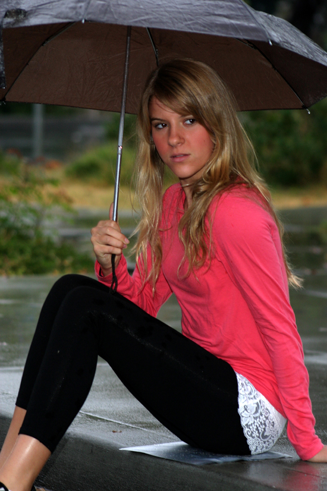 Female model photo shoot of Sydney Allen in In the Rain