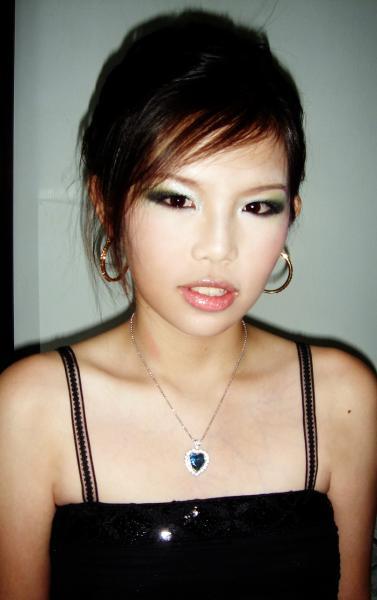 Female model photo shoot of Leoreis J, makeup by Vnee Fong