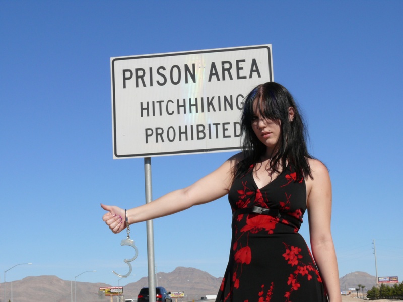 Male and Female model photo shoot of Sin City Photographer and Lieara in Prison Area