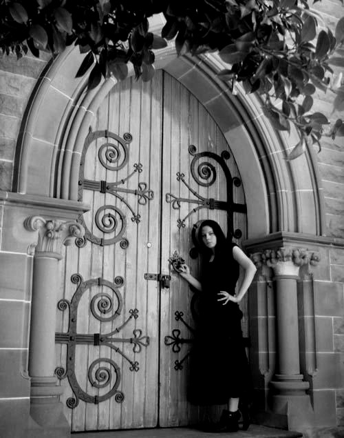 Female model photo shoot of Miss take vamp in graveyard church