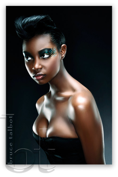 Male and Female model photo shoot of Bruce Talbot and Valencia Davis in Roilux, makeup by ROSHAR