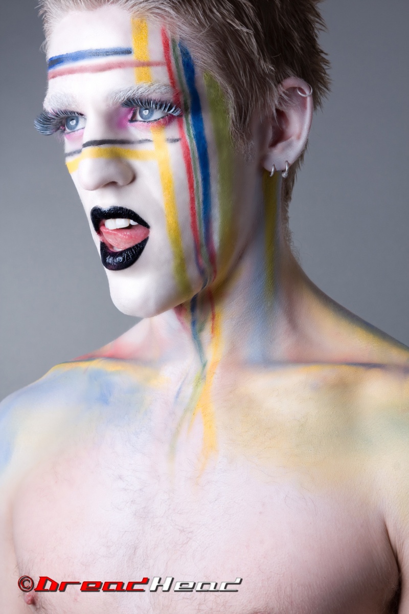 Male model photo shoot of Jerrad Layne by Dreadhead Photo in Austin, makeup by DollupbyDee