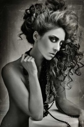 Female model photo shoot of tahni daniels hair