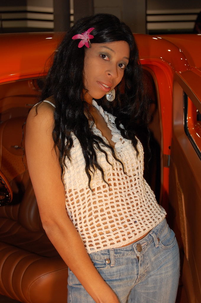 Female model photo shoot of Samarra Wise by NIKONCANDY in World of Wheels Car Show
