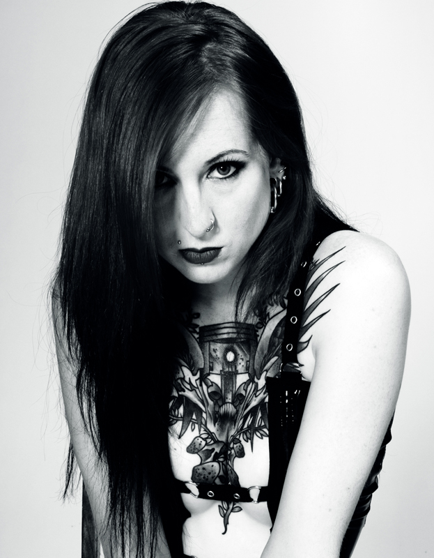 Female model photo shoot of Kitty Elixir by Crescent Moon, clothing designed by Black Sunshine Clothing