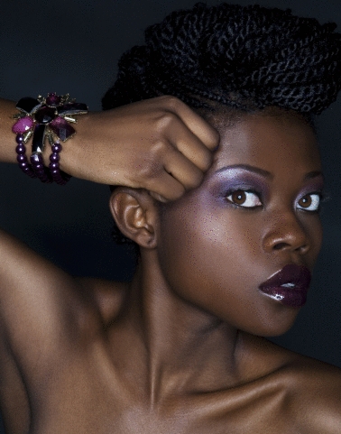 Female model photo shoot of Phina_A, makeup by Taisha Hollensworth
