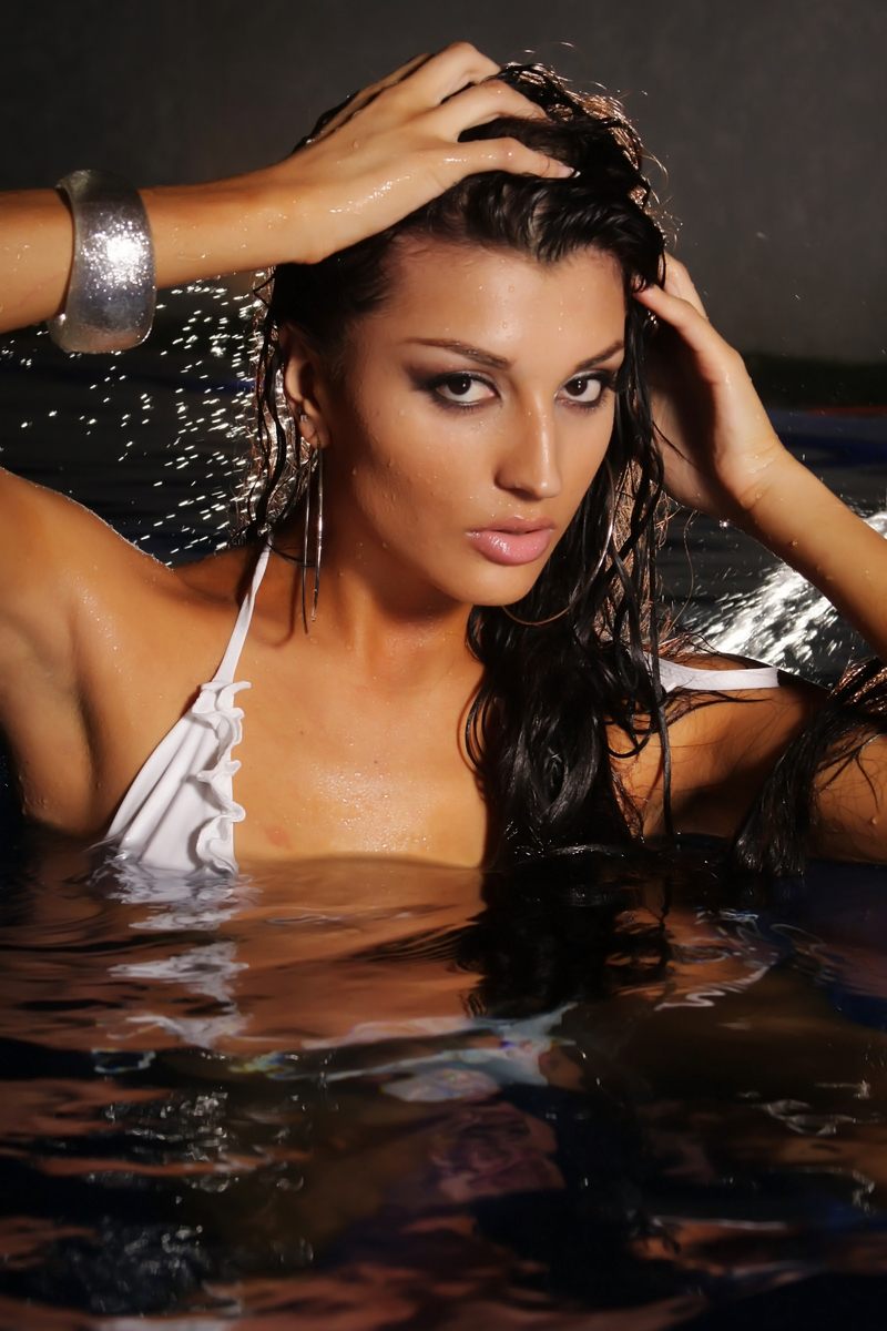 Female model photo shoot of VIVIANA BETANCUR in Pool Central America