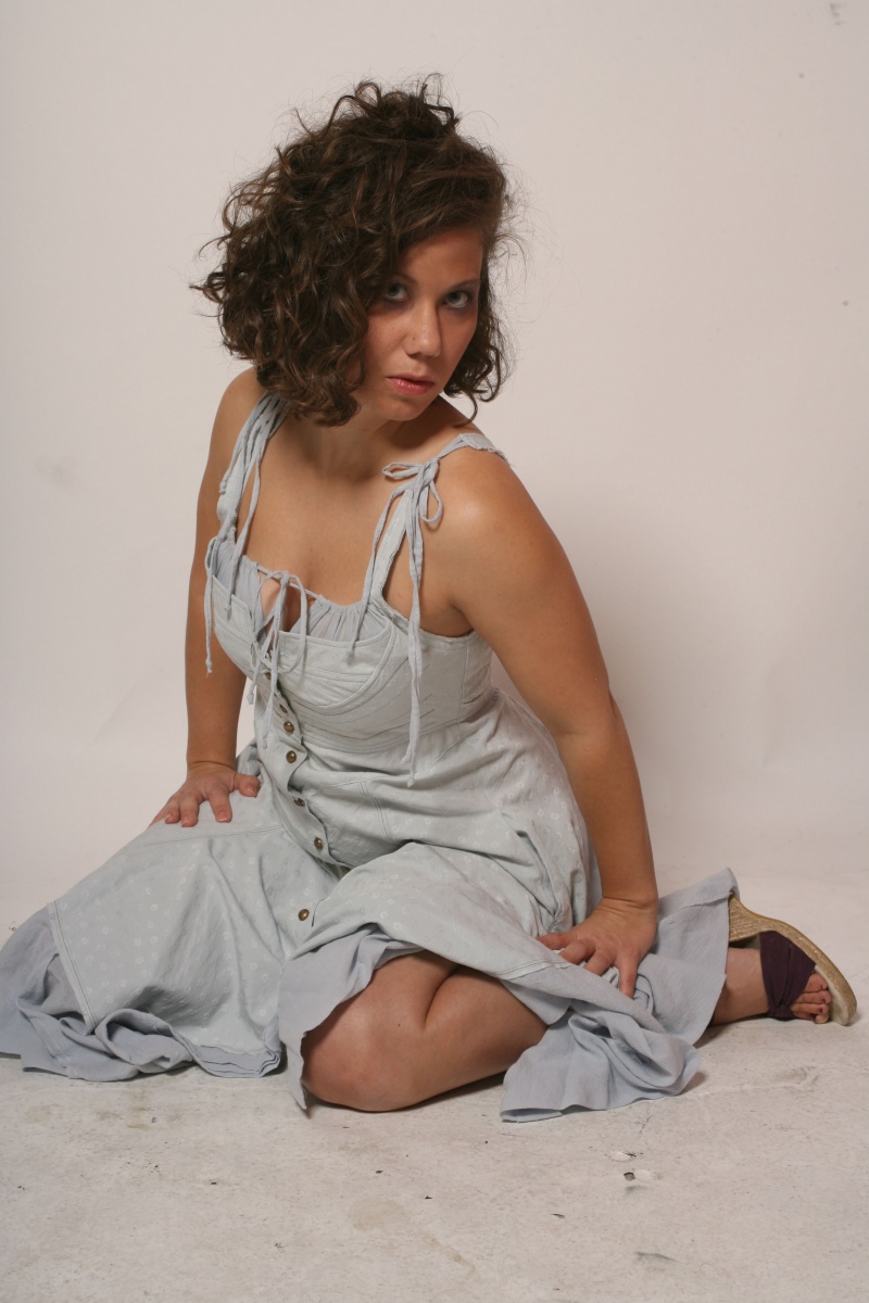 Female model photo shoot of curly sue