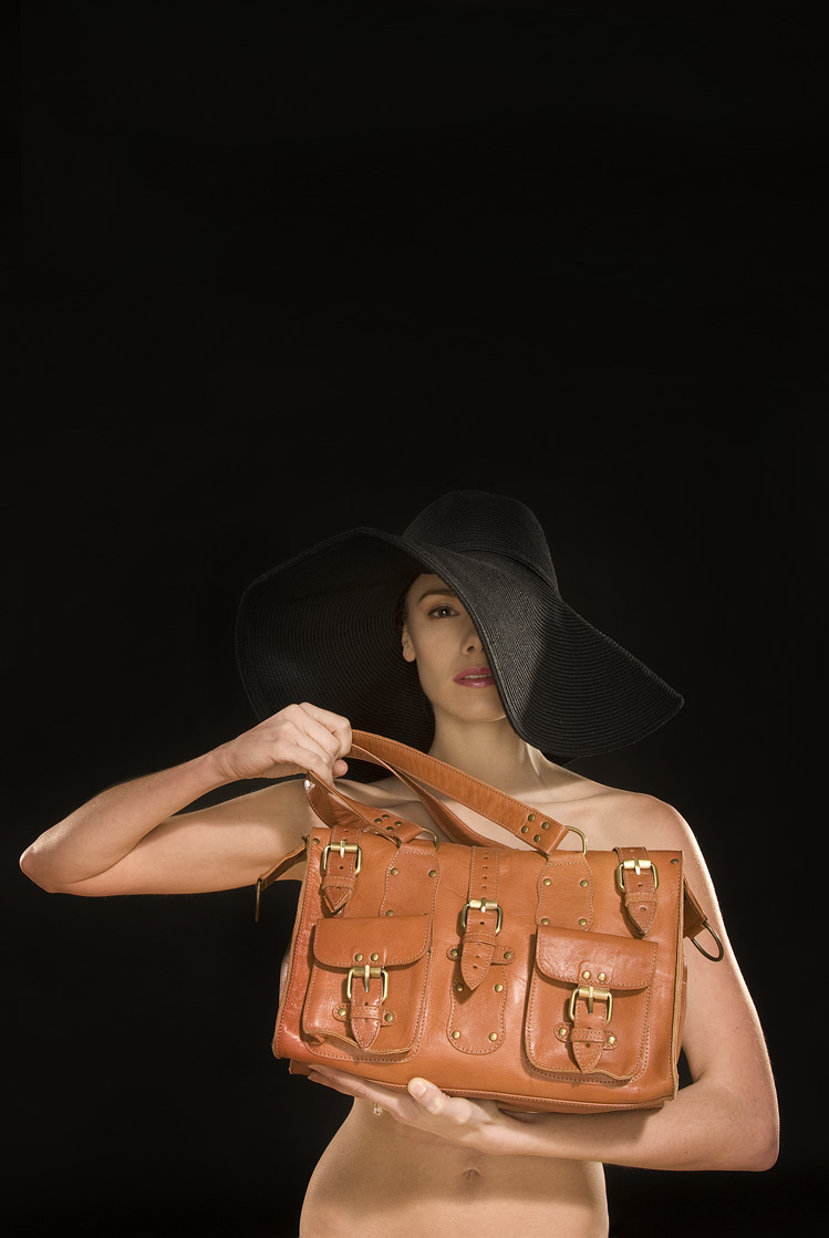 Female model photo shoot of Katie Heymer in Orbit Studios, wardrobe styled by Leather Accessories