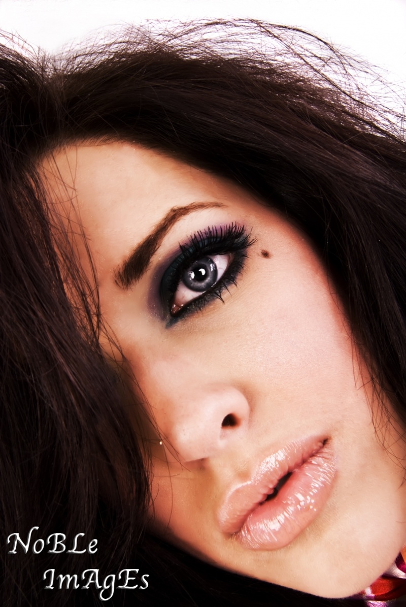 Female model photo shoot of BrittaKhol Makeup in Denver Colorado