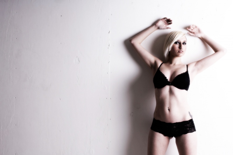 Female model photo shoot of SJ Ellson by DannyLenihan in Stagsden Studio, makeup by Sian Hammer