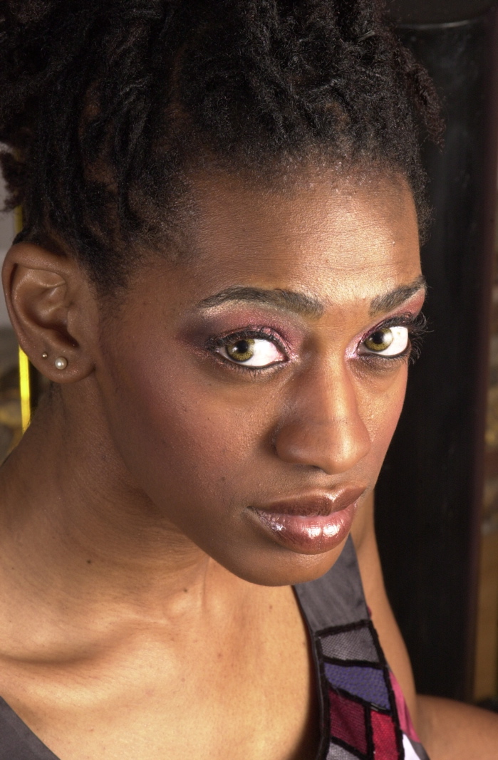 Female model photo shoot of Genise W by images 214, makeup by Eyes of an Artist  LP