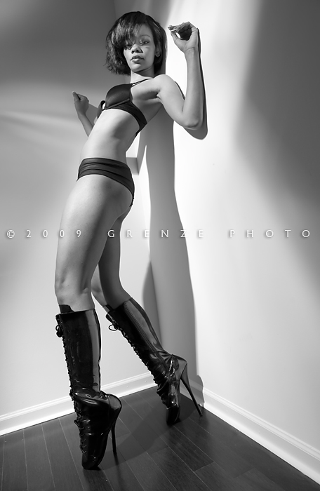 Female model photo shoot of Jasmin b by G R E N Z E in A corner