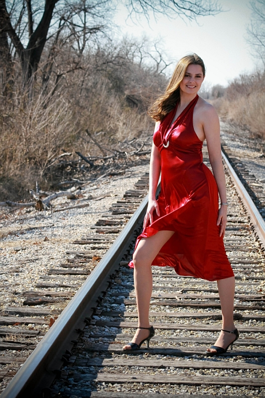 Female model photo shoot of Lisa Wilson by Nadias Photography in Railroad tracks in OK
