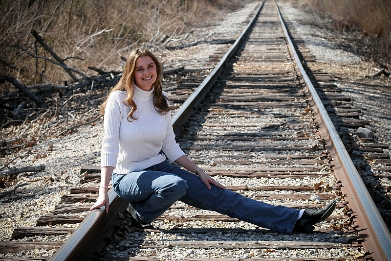 Female model photo shoot of Lisa Wilson by Nadias Photography in Railroad tracks in OK