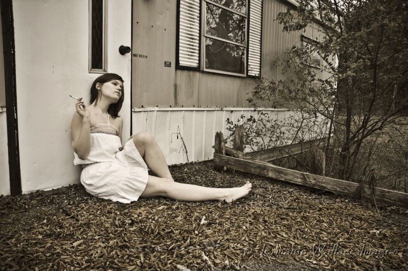 Female model photo shoot of Sara Virginia in Abandoned trailer