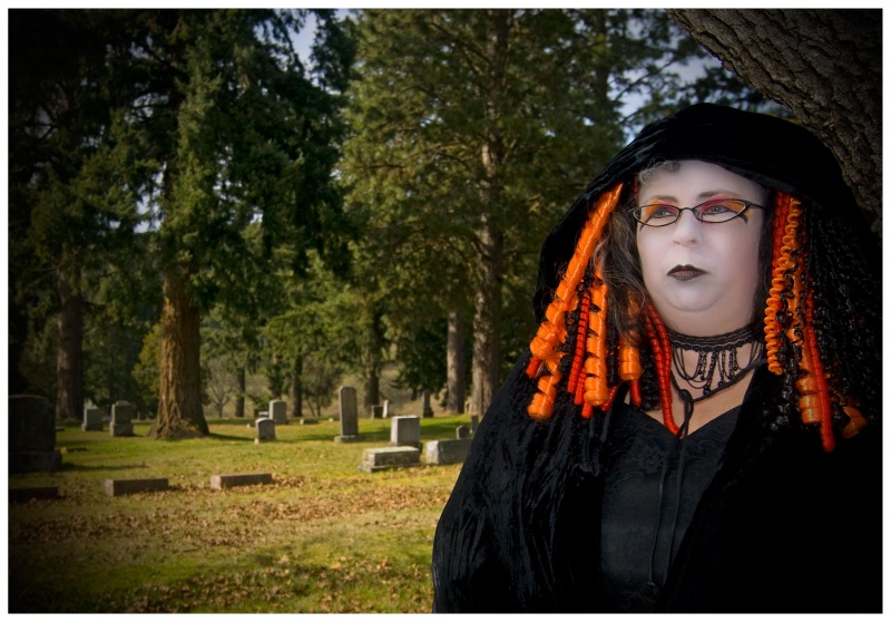 Female model photo shoot of gothbaby by Beltane Photography in Brownsville Cemetary