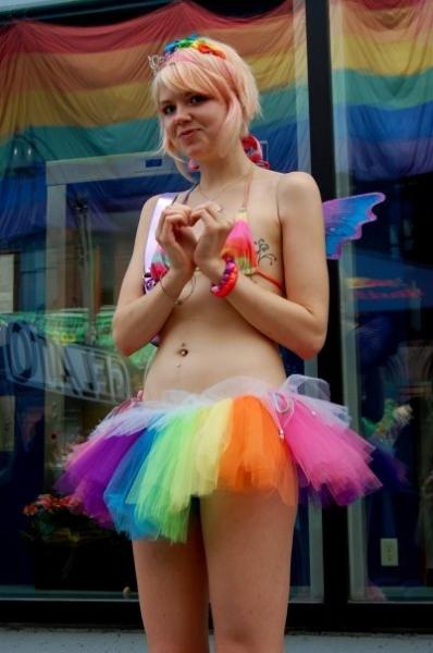 Female model photo shoot of LoriTwinkles in Toronto Pride Parade 2008