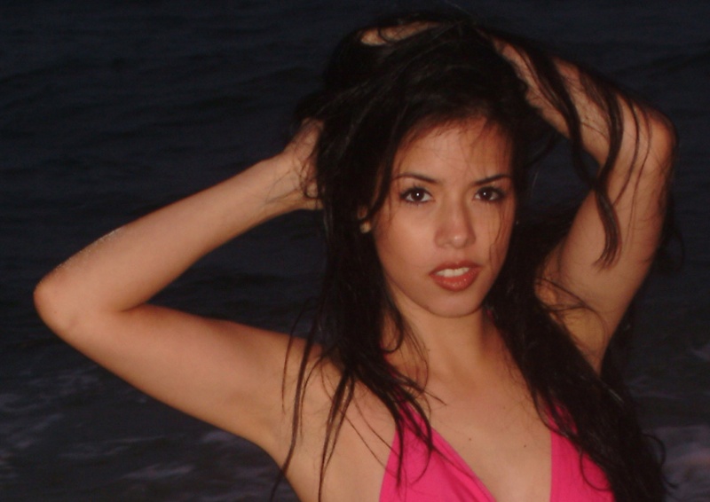 Female model photo shoot of Juliana Duque in Beach