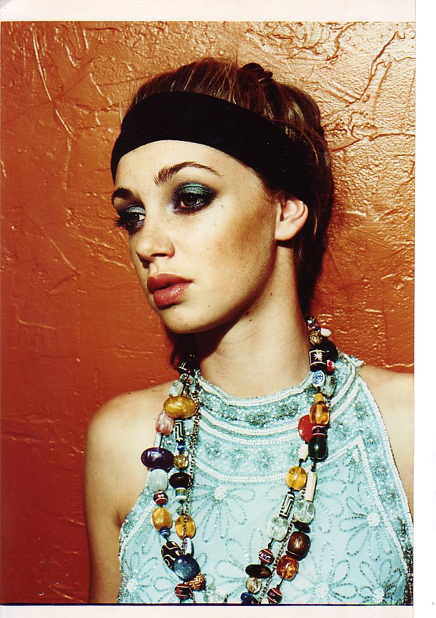 Female model photo shoot of Powderpuff Makeup