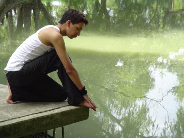 Male model photo shoot of Abraham Mendoza in Duck Pond in Victoria, Texas