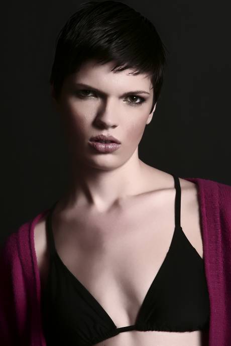 Female model photo shoot of Cassandra Hayes in cyc studio