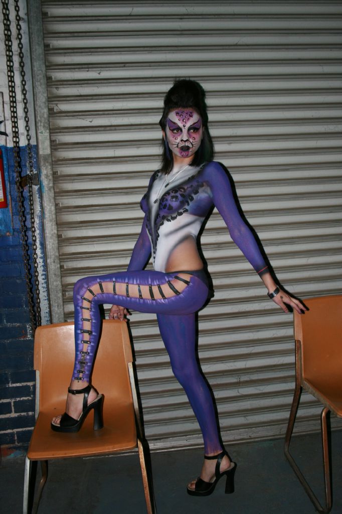 Female model photo shoot of CA Face and Body Art, hair styled by NOGODAR, body painted by Fresno Face Art