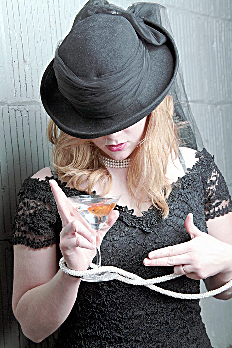 Female model photo shoot of orange canary by Jim Jurica in Chicago,IL 2009