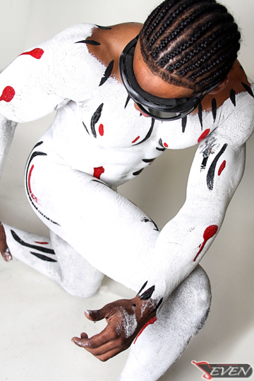 Male model photo shoot of Photography by Seven and Jmoreen in Mowse Cafe, body painted by invisible galleries