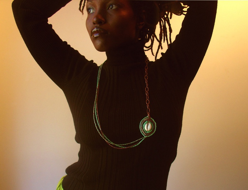 Female model photo shoot of Nzingah