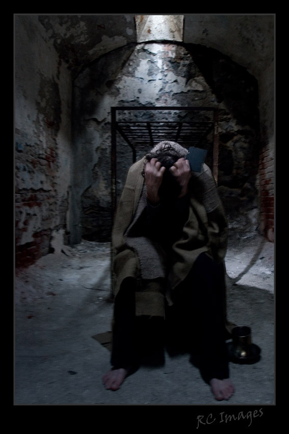 Male model photo shoot of james shoemaker in eastern state Penitentiary* ...cell block