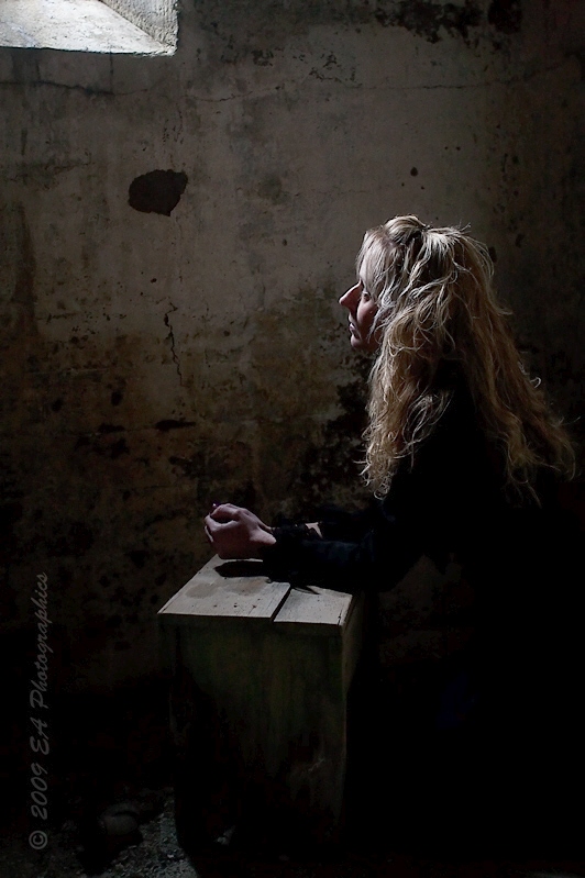 Female model photo shoot of Lynn Louise by EA Photographics in Eastern State Penitentiary