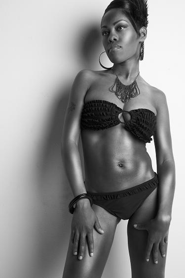 Female model photo shoot of SFoskey by Dallas J. Logan, wardrobe styled by Styled By Butch , makeup by ORLANE BENAU