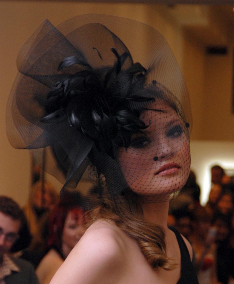 Female model photo shoot of Jasmin Zorlu Millinery and A n a in Lovesick 2 Fashion show, Muse Studios