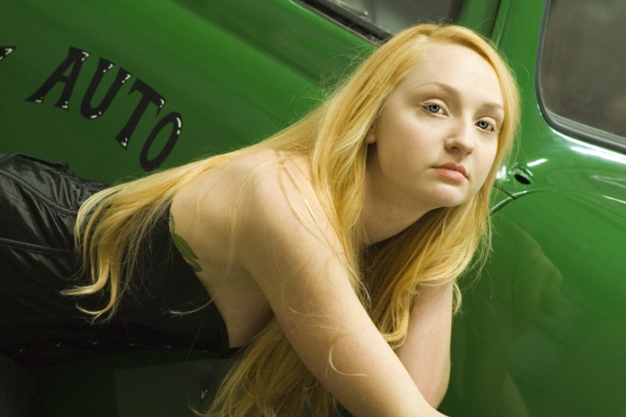 Female model photo shoot of Lou Harrison in Hays Antique Truck Museum, Woodland, Ca