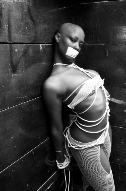 Female model photo shoot of Cocoa Chantel by Rebecca Rakas in Basement